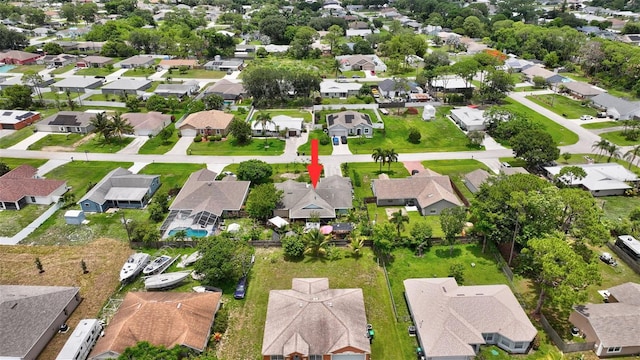 502 SE Guava Ter, Port St Lucie, FL 34983 - aerial view of property and surrounding area featuring nearby suburban area