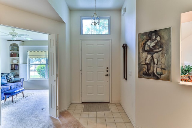 585 W Barrymore Dr, Beverly Hills, FL 34465 - entrance foyer featuring a ceiling fan and a chandelier