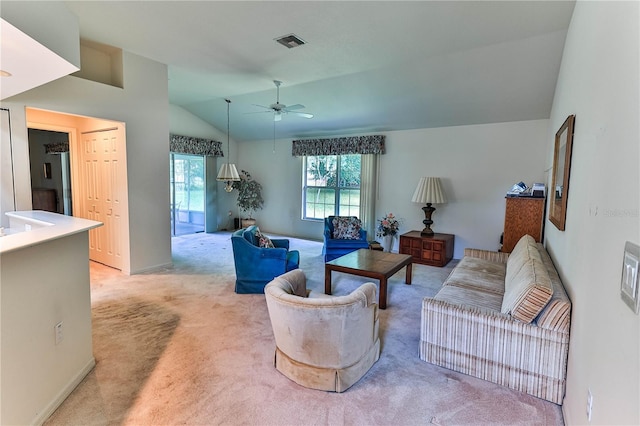 585 W Barrymore Dr, Beverly Hills, FL 34465 - living room featuring light colored carpet, vaulted ceiling, and a ceiling fan