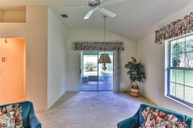 585 W Barrymore Dr, Beverly Hills, FL 34465 - living area with light carpet, lofted ceiling, healthy amount of natural light, and ceiling fan