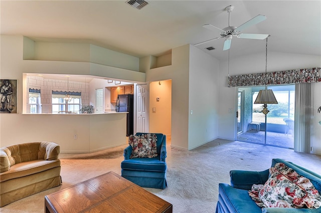 585 W Barrymore Dr, Beverly Hills, FL 34465 - living area featuring light colored carpet, ceiling fan, and high vaulted ceiling