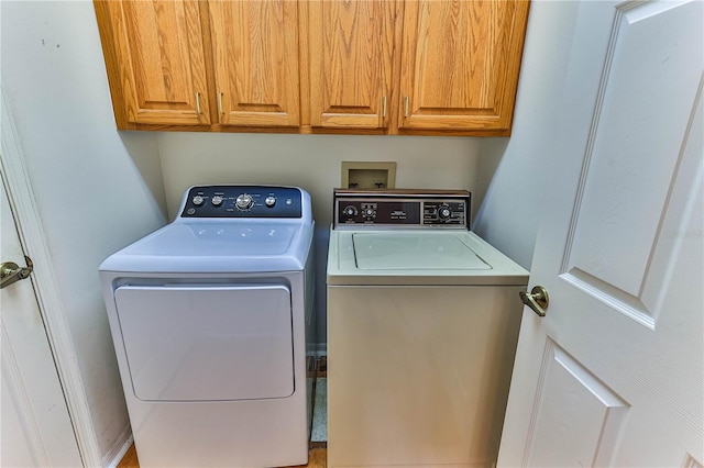 585 W Barrymore Dr, Beverly Hills, FL 34465 - laundry area featuring washer and dryer and cabinet space