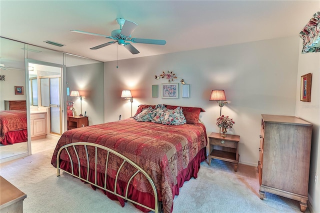 585 W Barrymore Dr, Beverly Hills, FL 34465 - bedroom with carpet floors, a ceiling fan, and ensuite bathroom