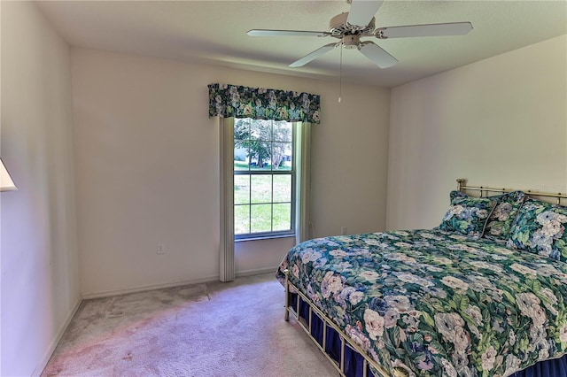 585 W Barrymore Dr, Beverly Hills, FL 34465 - bedroom with light carpet and ceiling fan