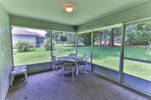 585 W Barrymore Dr, Beverly Hills, FL 34465 - sunroom / solarium with outdoor dining area