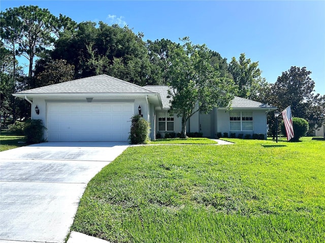 585 W Barrymore Dr, Beverly Hills, FL 34465 - single story home featuring a front yard, stucco siding, concrete driveway, and a garage