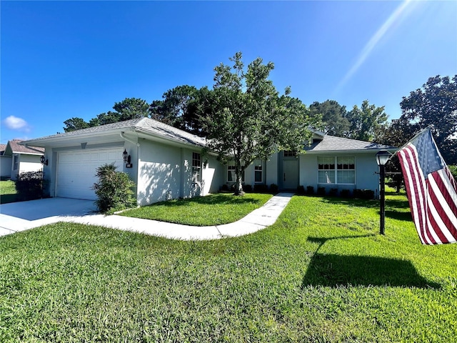 585 W Barrymore Dr, Beverly Hills, FL 34465 - single story home with stucco siding, a front yard, a garage, and driveway
