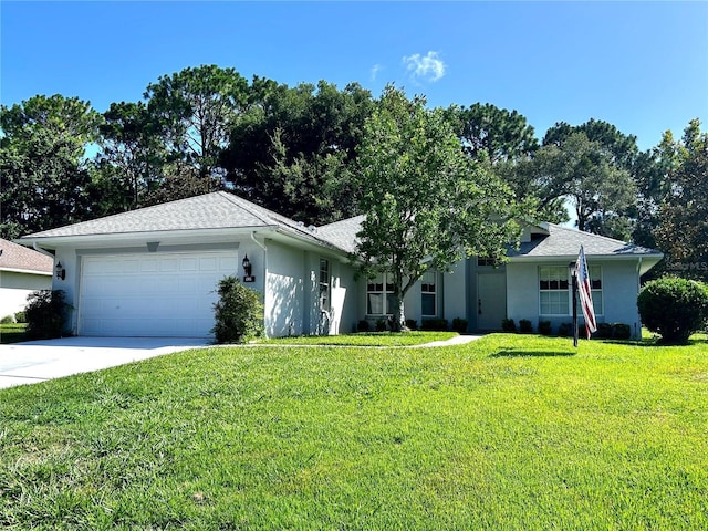 585 W Barrymore Dr, Beverly Hills, FL 34465 - ranch-style home featuring a garage, stucco siding, a front yard, driveway, and roof with shingles