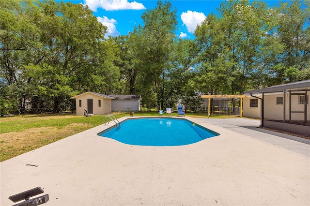 802 NE 39th Ct, Ocala, FL 34470 - outdoor pool with a patio, an outbuilding, and view of wooded area
