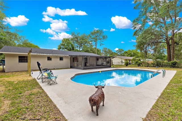 802 NE 39th Ct, Ocala, FL 34470 - view of pool with a sunroom and a patio