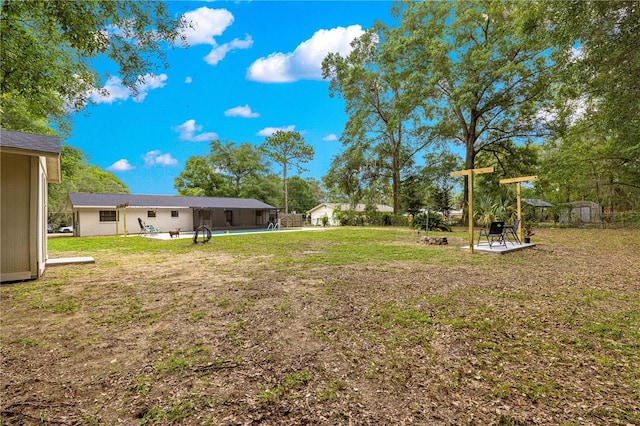 802 NE 39th Ct, Ocala, FL 34470 - view of green lawn featuring a patio