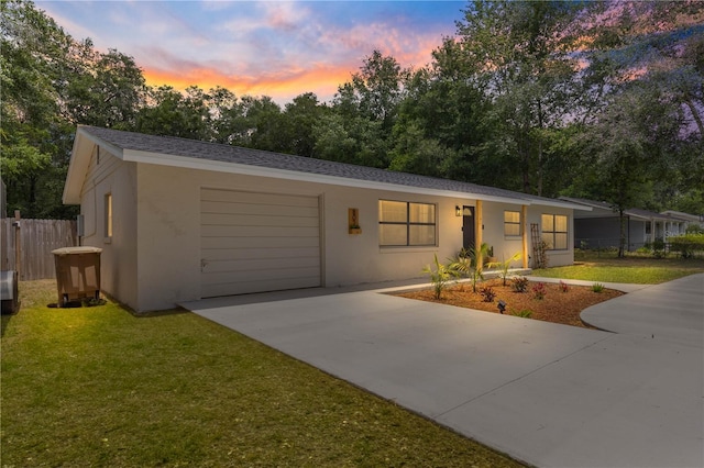 802 NE 39th Ct, Ocala, FL 34470 - ranch-style home featuring concrete driveway, a garage, and stucco siding