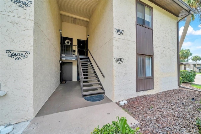 683 Midway Dr Unit B, Ocala, FL 34472 - view of exterior entry featuring stucco siding