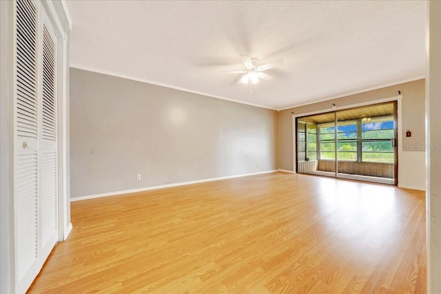 683 Midway Dr Unit B, Ocala, FL 34472 - unfurnished room with a ceiling fan, light wood-style flooring, and crown molding