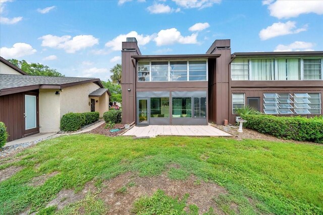 683 Midway Dr Unit B, Ocala, FL 34472 - back of property featuring a yard