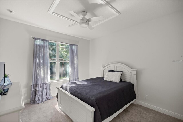 3993 SE 10th Ave, Ocala, FL 34480 - bedroom with light carpet and a ceiling fan