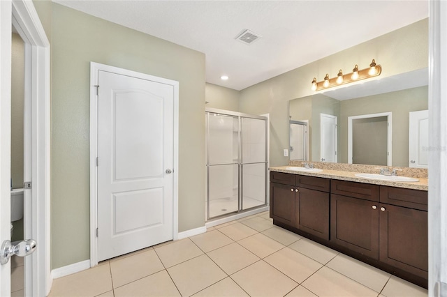 7054 SW 64th Ter, Ocala, FL 34476 - full bath with double vanity, a stall shower, and tile patterned floors