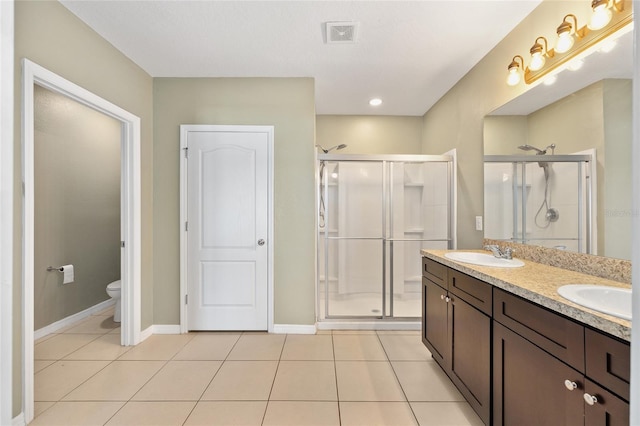 7054 SW 64th Ter, Ocala, FL 34476 - full bathroom with double vanity, a stall shower, and tile patterned floors