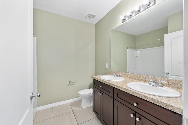 7054 SW 64th Ter, Ocala, FL 34476 - bathroom featuring double vanity, tile patterned floors, and a shower