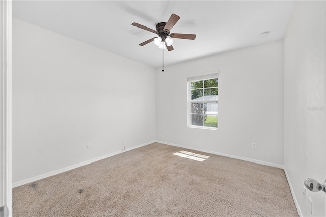 7054 SW 64th Ter, Ocala, FL 34476 - carpeted spare room with baseboards and a ceiling fan