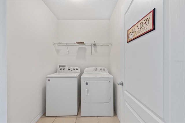 7054 SW 64th Ter, Ocala, FL 34476 - laundry area featuring independent washer and dryer and light tile patterned floors