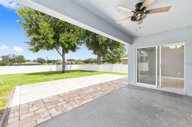 7054 SW 64th Ter, Ocala, FL 34476 - fenced backyard with a water view, a ceiling fan, and a patio