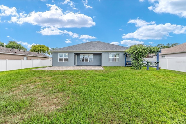 7054 SW 64th Ter, Ocala, FL 34476 - back of property featuring a patio area, stucco siding, and a fenced backyard