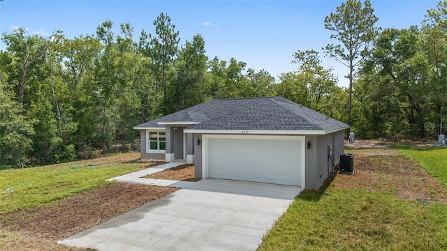 2297 SW 143rd Ct, Ocala, FL 34481 - view of front of house with stucco siding, roof with shingles, a garage, concrete driveway, and a front yard