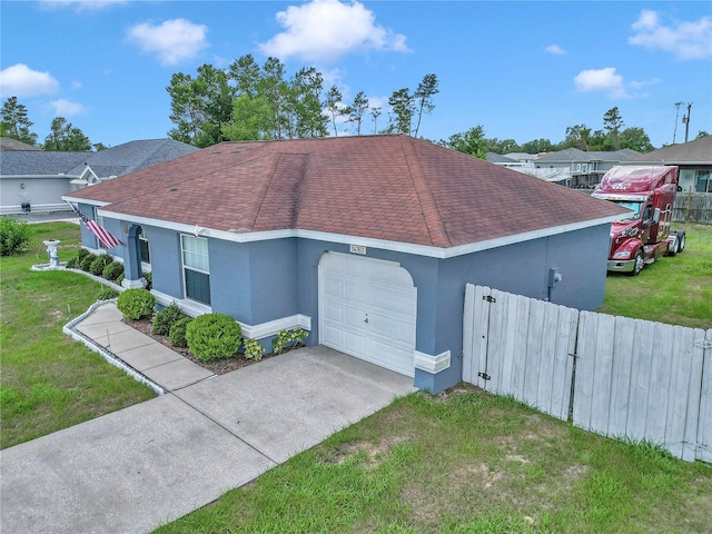 14762 SW 22nd Court Rd, Ocala, FL 34473 - view of front facade with a shingled roof, stucco siding, an attached garage, and driveway