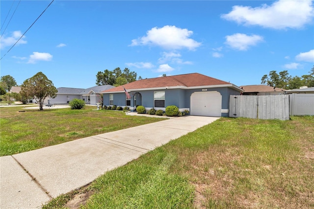 14762 SW 22nd Court Rd, Ocala, FL 34473 - ranch-style house featuring an attached garage, stucco siding, and driveway