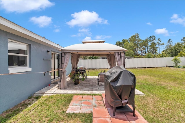 14762 SW 22nd Court Rd, Ocala, FL 34473 - fenced backyard featuring a gazebo and a patio