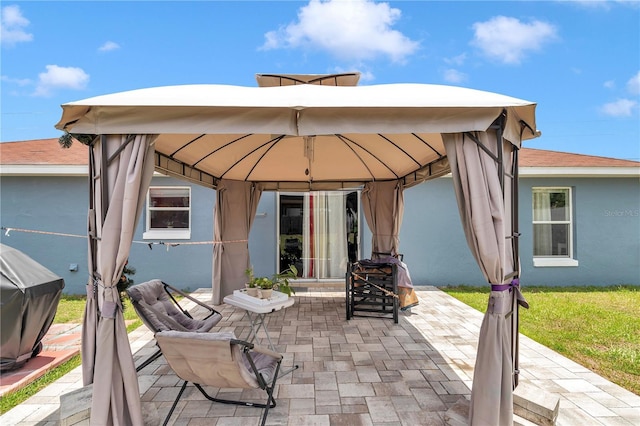 14762 SW 22nd Court Rd, Ocala, FL 34473 - view of patio / terrace featuring a gazebo and grilling area