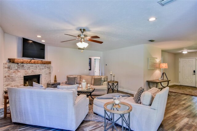 2855 SE 38th St, Ocala, FL 34480 - living room featuring wood finished floors, ceiling fan, a fireplace, and recessed lighting