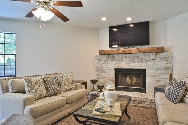 2855 SE 38th St, Ocala, FL 34480 - living area featuring a brick fireplace, a textured ceiling, a ceiling fan, and recessed lighting