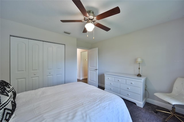 2855 SE 38th St, Ocala, FL 34480 - bedroom with a closet, dark colored carpet, and ceiling fan