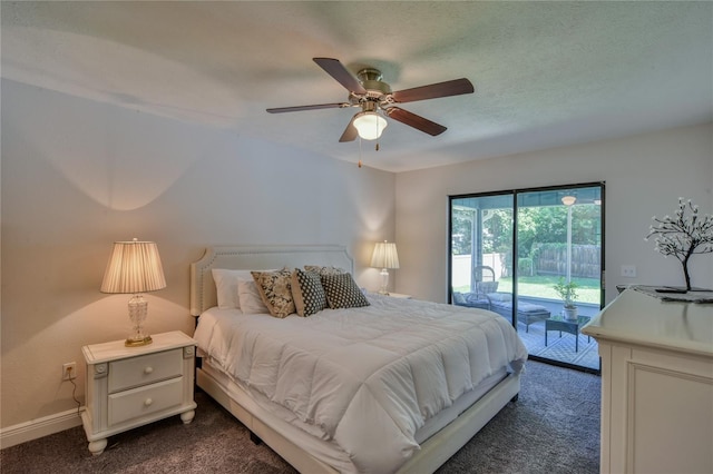 2855 SE 38th St, Ocala, FL 34480 - bedroom with dark carpet, access to exterior, and a ceiling fan