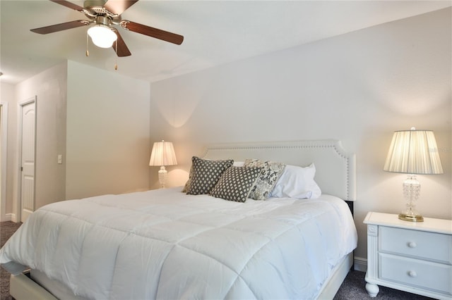 2855 SE 38th St, Ocala, FL 34480 - bedroom with dark colored carpet and ceiling fan