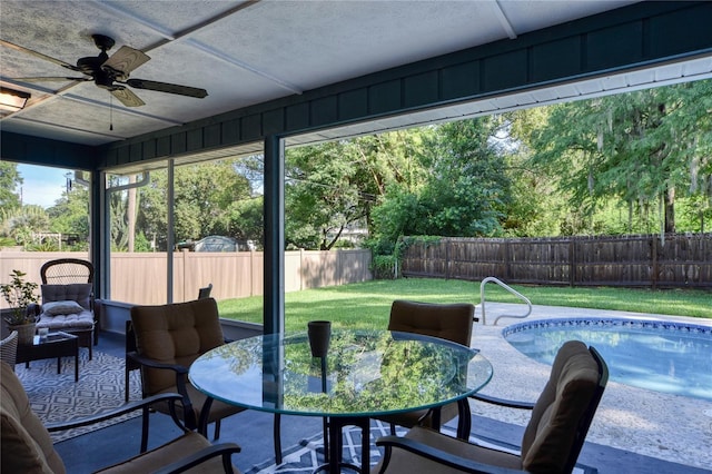 2855 SE 38th St, Ocala, FL 34480 - sunroom / solarium with a ceiling fan and outdoor dining area