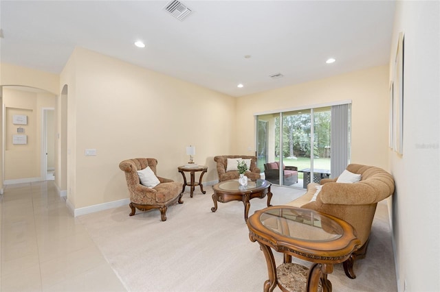 5024 SW 114th Street Rd, Ocala, FL 34476 - living area featuring arched walkways, recessed lighting, and light tile patterned flooring