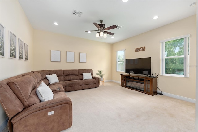 5024 SW 114th Street Rd, Ocala, FL 34476 - carpeted living room with plenty of natural light, recessed lighting, and a ceiling fan