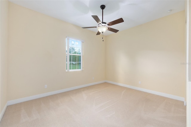 5024 SW 114th Street Rd, Ocala, FL 34476 - spare room with light carpet, a ceiling fan, and a smoke detector