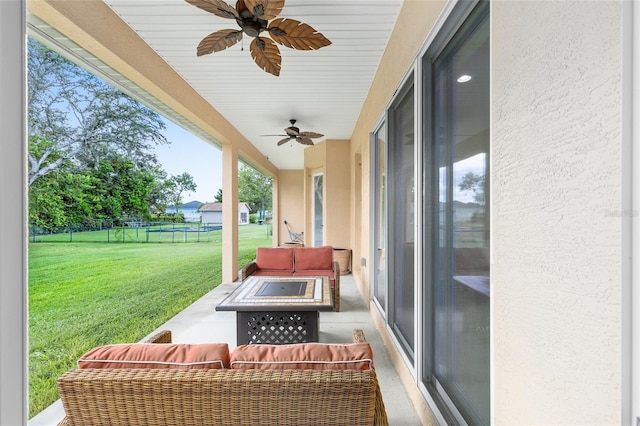 5024 SW 114th Street Rd, Ocala, FL 34476 - view of patio with a ceiling fan and an outdoor living space with a fire pit