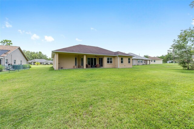 5024 SW 114th Street Rd, Ocala, FL 34476 - back of house featuring stucco siding