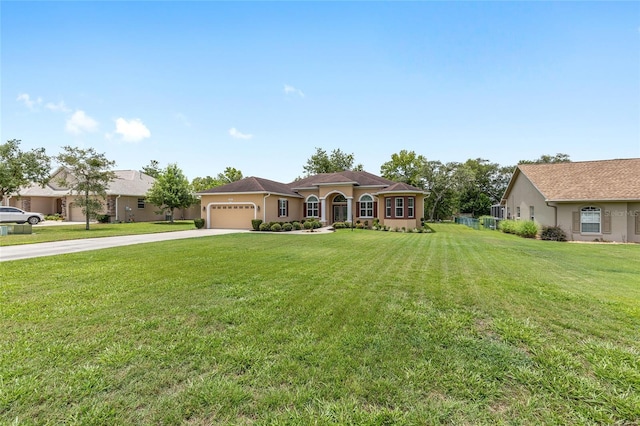 5024 SW 114th Street Rd, Ocala, FL 34476 - view of front facade featuring concrete driveway, a garage, and a front yard