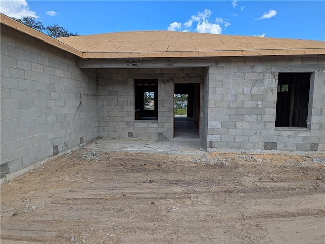 13322 SW 85th Cir, Ocala, FL 34473 - entrance to property with concrete block siding and a shingled roof