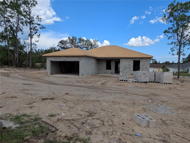 13322 SW 85th Cir, Ocala, FL 34473 - back of property with an attached garage and driveway