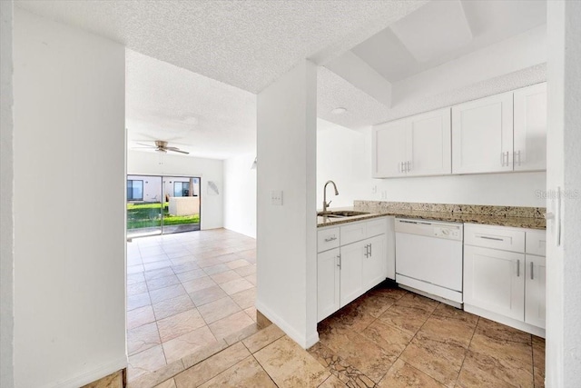 329 Marion Oaks Blvd Unit A3, Ocala, FL 34473 - kitchen with white dishwasher, a textured ceiling, white cabinetry, light stone counters, and open floor plan