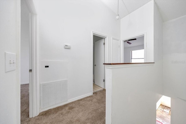 329 Marion Oaks Blvd Unit A3, Ocala, FL 34473 - hall with carpet flooring and a textured ceiling