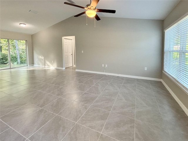 10347 N Halsey Way, Dunnellon, FL 34434 - empty room featuring tile patterned flooring, vaulted ceiling, and ceiling fan