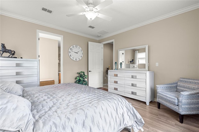 9925 SW 95th Loop, Ocala, FL 34481 - bedroom featuring ornamental molding, wood finished floors, ceiling fan, and ensuite bath